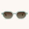 Mr. Woodini Drift sustainable sunglasses in Milky Cyan bio-acetate frame featuring warm walnut wood inlays and gradient brown polarized lenses.